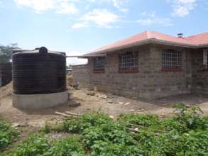 Kitchen with a Water Tank for Rainwater Harvesting
