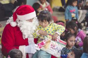 Santa visits kids in the market (December 2017)