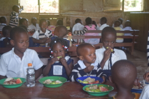 Children enjoying healthy school meals at SITL