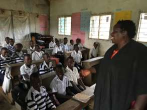 Director Rose Mugenyi with Primary 5
