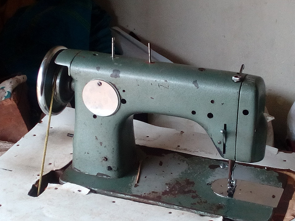 The Tailors Were Using Old Sewing Machines