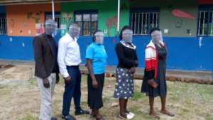 Teachers in PPE, ready to teach