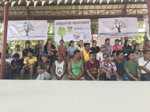 Distributing food and hygiene kits