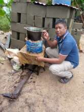 Boiling water with biochar stove