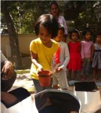 Adding potting mix