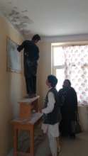 Workers patching up cracks