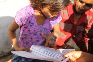 Aarti has learnt to read her local language..