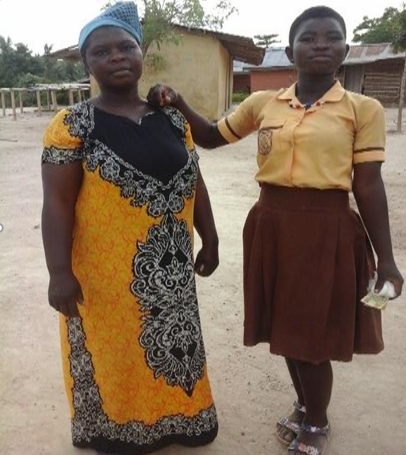 a mother poses next to her daughter in the Teen Girls Club