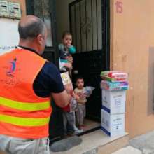 Door to door distribution of relief goods by CHCS.