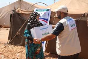 Woman Receiving Ration Packet