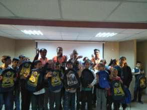 CHCS team distributing stationary in a school