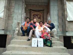 CHCS, Team with a Syrian Refugee family in Urfa.