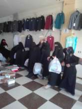 Women Receiving Abayas