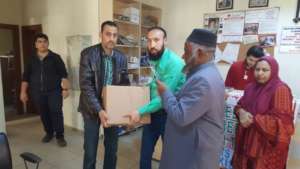 Relief goods being distributed among the Syrians