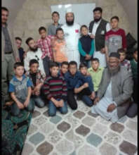 Dr. Asif Mahmood Jah with the Syrian Orphans