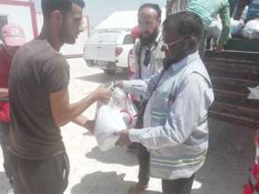 Ration Packet Handed Over to the Refugee