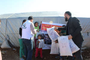 Relief goods being distributed among Syrian Refuge