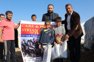 Relief goods being distributed among Syrian Refuge