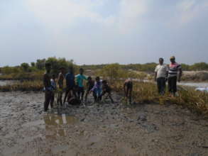 students in planting work