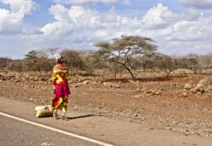 Rendile woman pulling water in Marsabit County