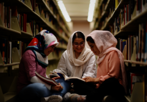 Arifa, Zahra & Hadisa studying in the ASU library.