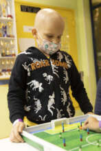 Guilherme playing at our hospital