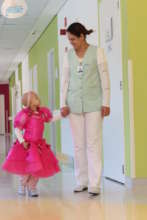 Patient dressed as princess with a nurse