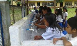 Washing hands before lunch at Kasambuhan ES