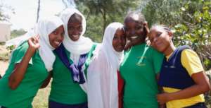 The girls share excited smiles