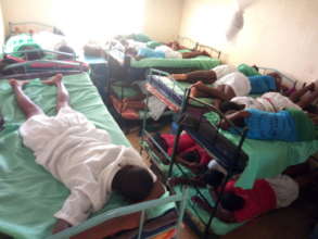 Sleeping two per bed the girls crowd into the dorm