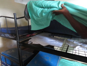School papers are stored under their mattresses