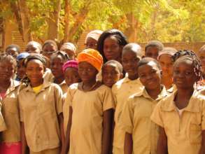 Martine with members of the Girls Awakening Club