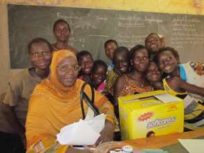 Madame Zalle with girls after the 1st MHM training