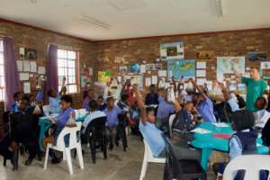 Eco Club students testing soil composition