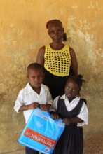 A grateful family receiving bed nets