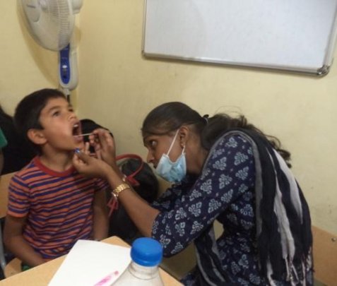 Doctor checking a child
