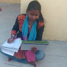 Nalini using her tablet