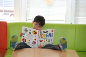 Boy at the Arche looking for ideas - toy ideas