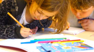 Two friends drawing togehter