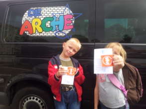Proudly presenting their swimming badges!