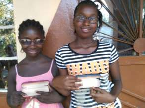 Aisha & Mabinty modeling their new glasses