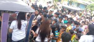 hundreds of children attend the community feeding