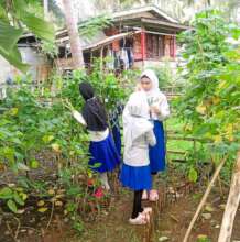 Students helping with school garden
