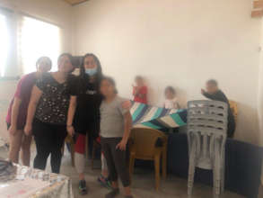Participants with Jaffa students amid COVID-19