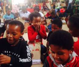 Hlumela receiving her Christmas parcel