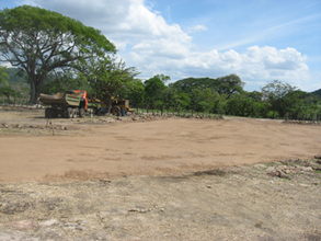 Grading the site for the clinic.