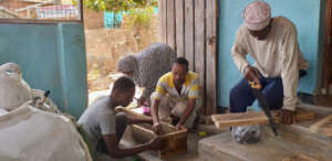 The team preparing boxes to house the blocks