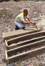 Mr. Kassim building the first block