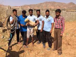 Nandu & the team with dog rescued from the well