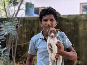 Gaffar with the puppy that has now been adopted